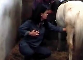 Creature gets a handjob from a horny brunette